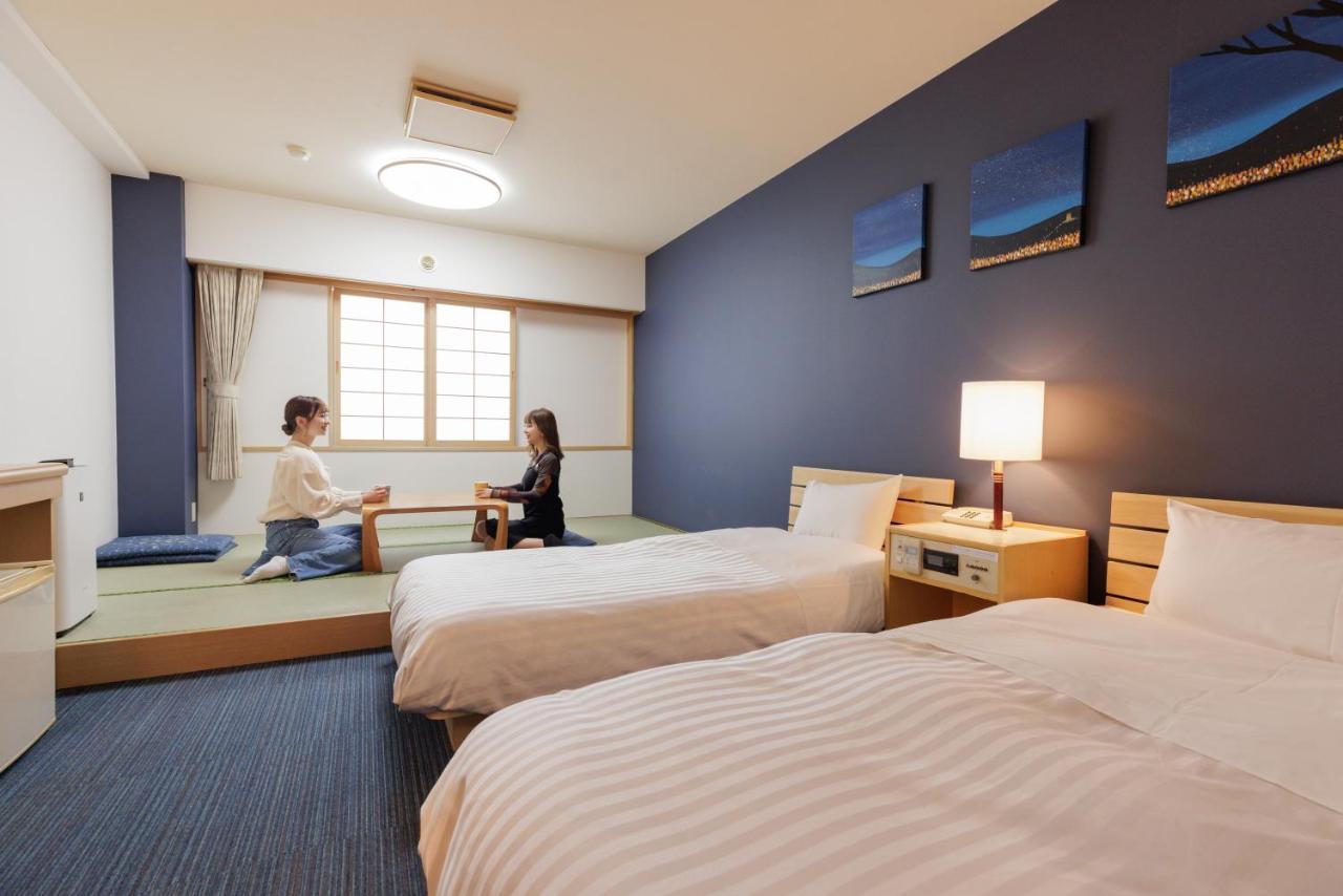 Ashibetsu Onsen Starlight Hotel Kamer foto