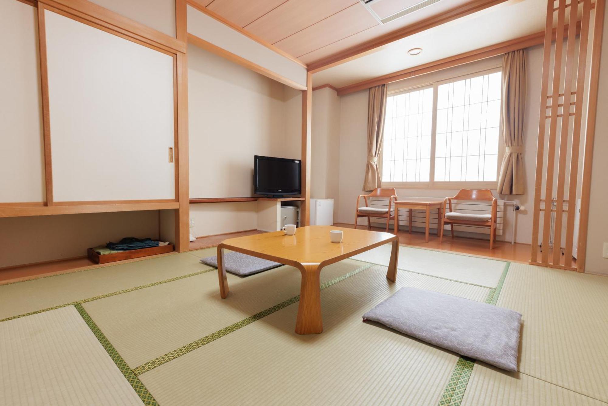 Ashibetsu Onsen Starlight Hotel Buitenkant foto